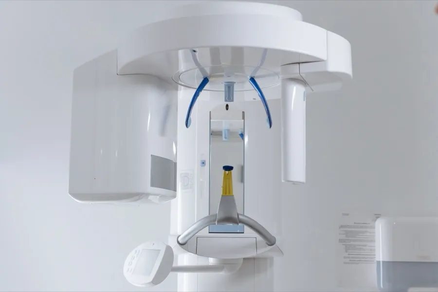 A panoramic dental x-ray unit in a clinic room